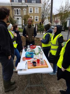 Briefing volunteers over tea & cake