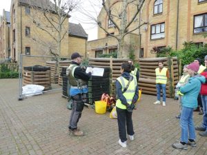 Photo of volunteers receiving a safety briefing