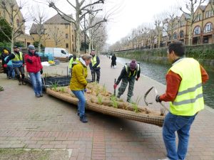 Photos of volunteers launching a raft